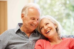 Older couple smiling together